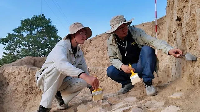 Chinese and Uzbek archaeologists discover ancient walls at site in Uzbekistan